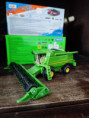 John Deere T670